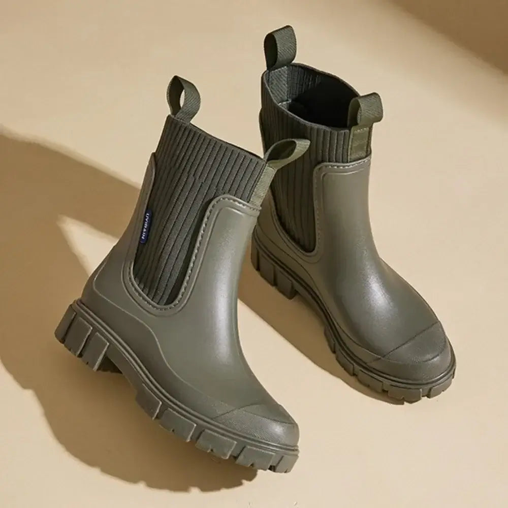 Chelsea rain boots, waterproof rubber Wellington boots with ribbed elastic collar in olive green.