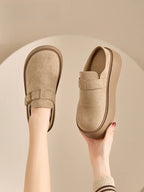 Women platform clog mules in soft suede with adjustable buckle and ergonomic sole, perfect for casual wear.