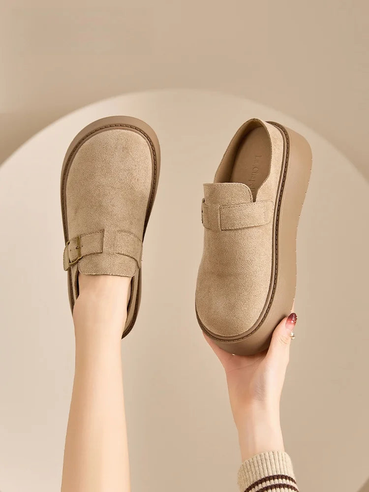Women platform clog mules in soft suede with adjustable buckle and ergonomic sole, perfect for casual wear.