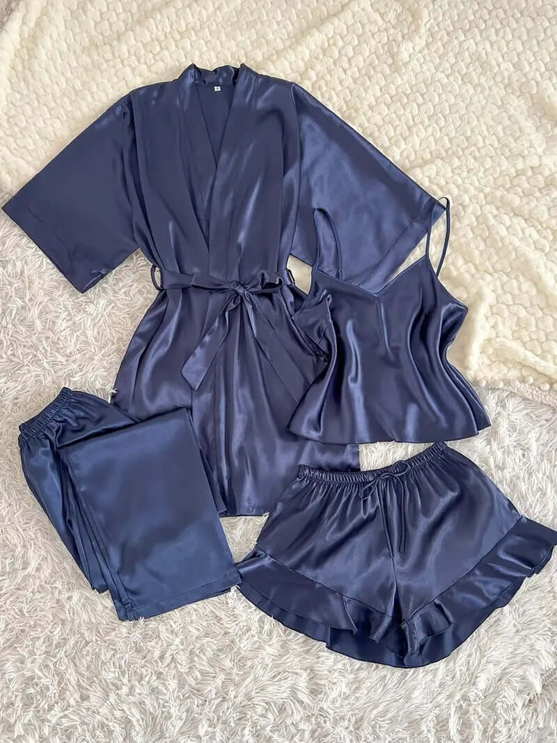 Women's 4-piece satin pajama set featuring kimono, cami, trousers, and shorts in deep navy bluish hue.