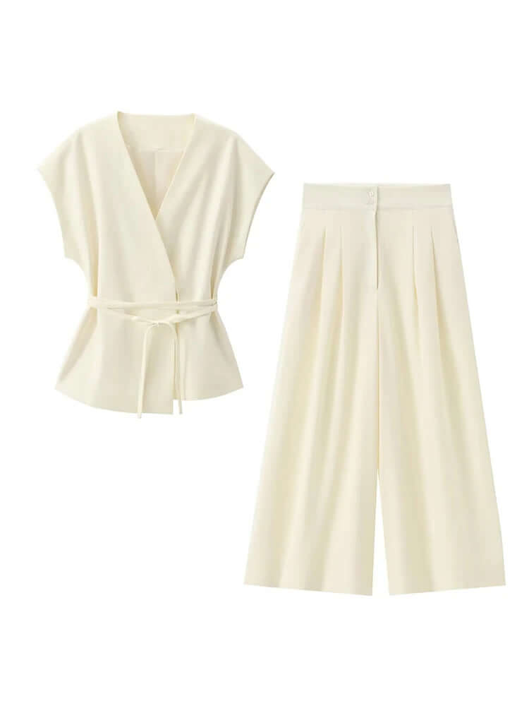 Women’s two-piece set featuring a sleeveless belted V-neck top with matching wide-leg trousers in cream.