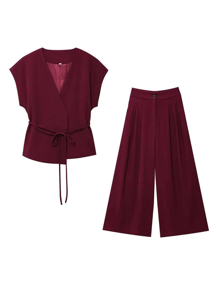 Women’s two-piece co-ord set featuring a sleeveless V-neck wrap top and wide-leg trousers in burgundy.