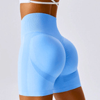 High-waisted seamless blue running shorts with ribbed waistband, designed for comfort and support during workouts.