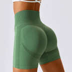 High waisted seamless running shorts in green, featuring ribbed waistband and contour knit design for comfort and style.