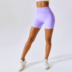 Women’s high waisted seamless workout shorts in lavender, perfect for gym and yoga with a supportive fit.