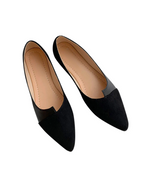Pointed toe black ballet flats made from soft faux suede, perfect for comfort and elegance in everyday wear.