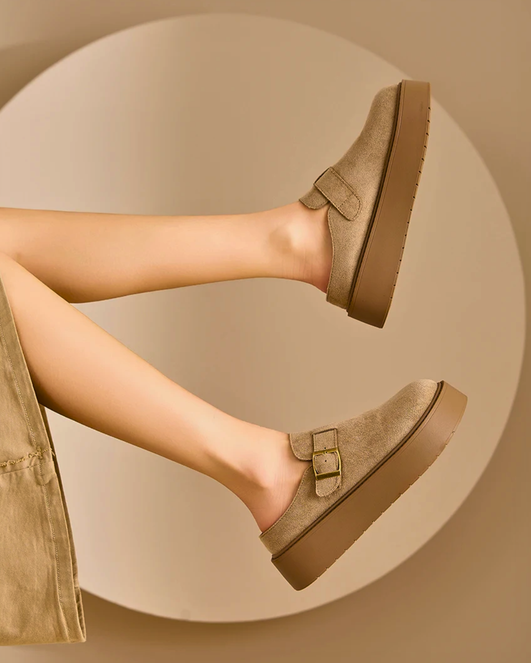 Women’s suede platform clog mules in beige with buckle, perfect for comfortable casual wear.