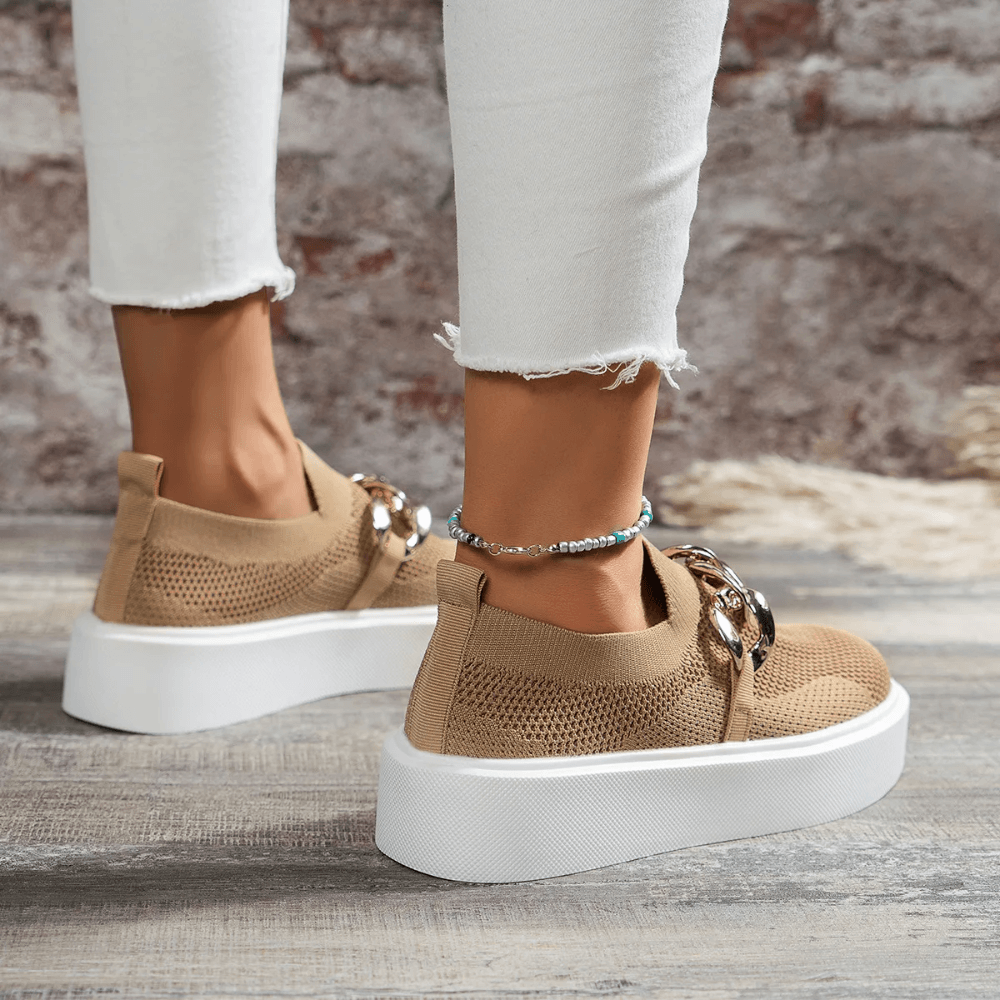 Side view of stylish orthopedic women's walking shoes with arch support and cushioned soles, perfect for all-day comfort.