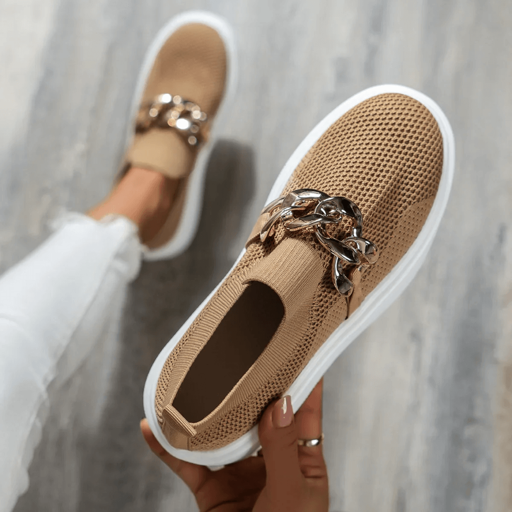Stylish orthopedic women's walking shoes with arch support and cushioned comfort in a beige color.
