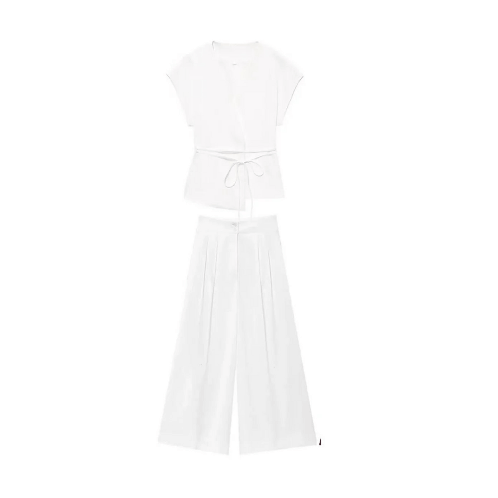Women's two-piece co-ord set featuring a sleeveless V-neck top and wide-leg trousers in white.