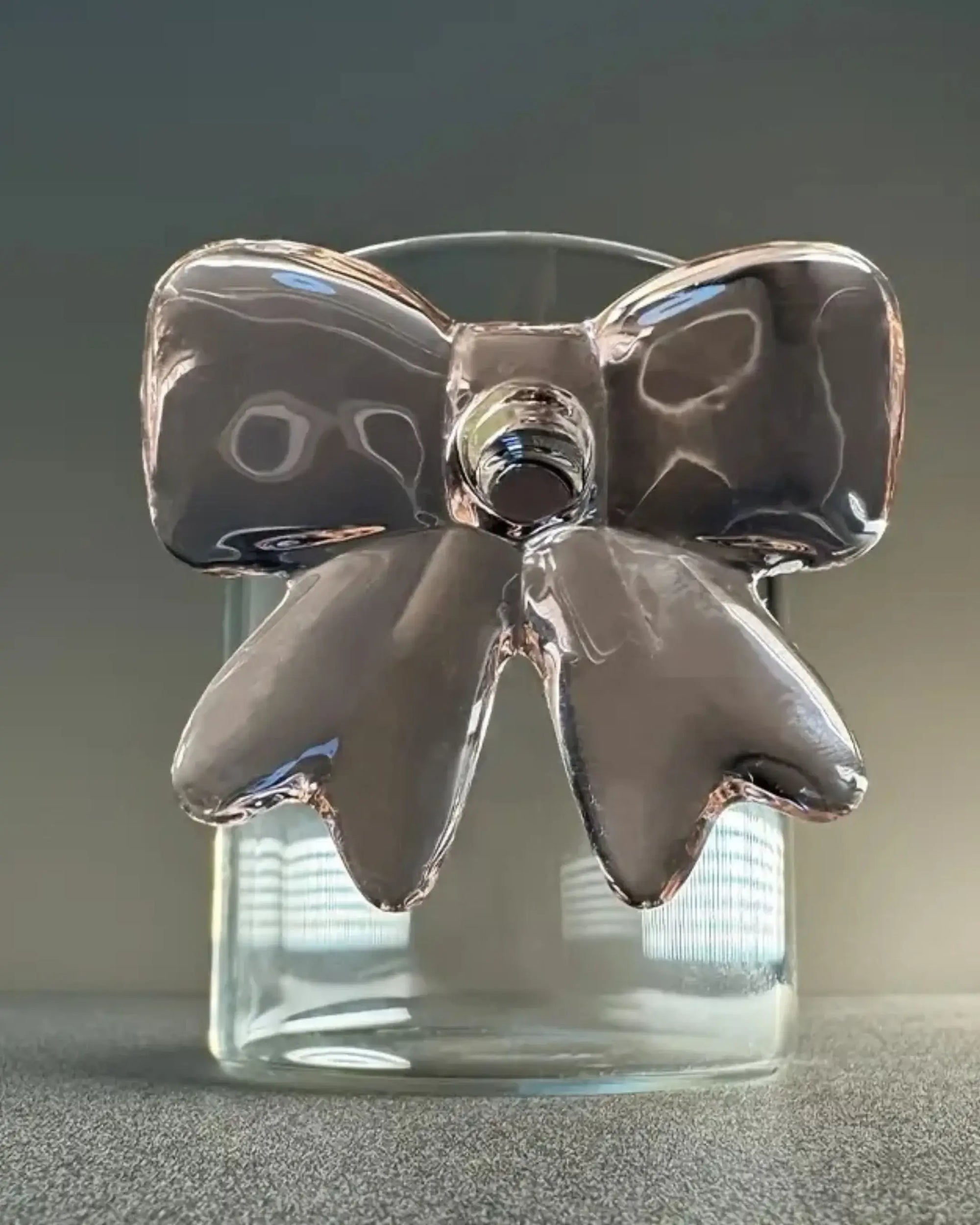 Clear glass cup with glossy black 3D bow - bold and aesthetic handmade drinkware