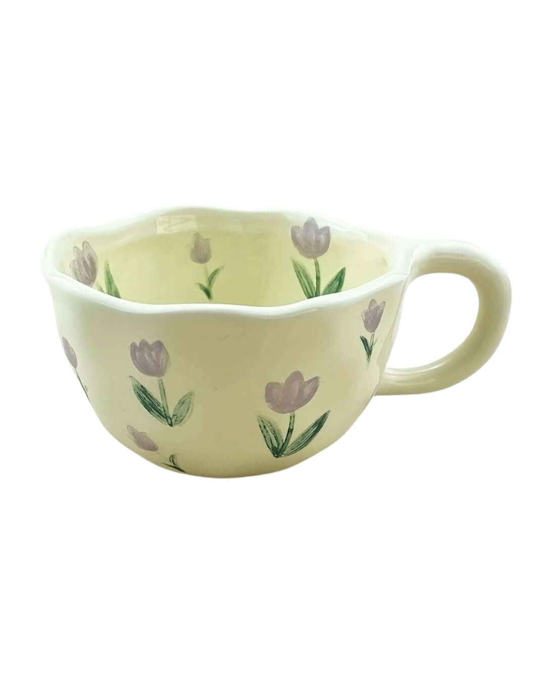 Flower pattern ceramic mug with hand-drawn floral design, perfect for coffee or tea.